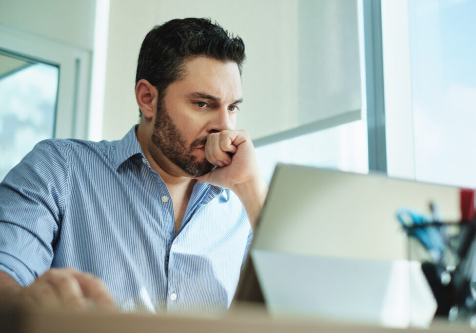 Angry man staring at computer anger tips header image